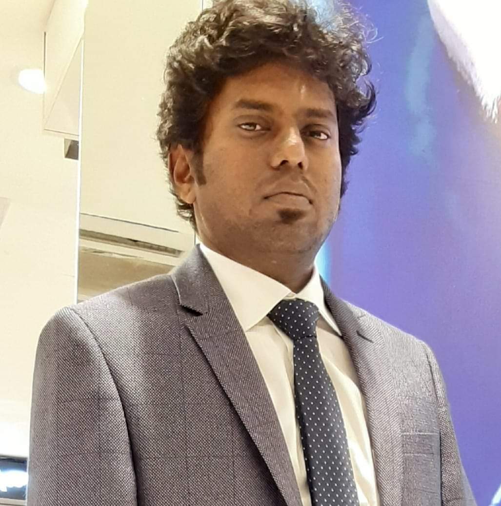 Dr. John Kiran Katari