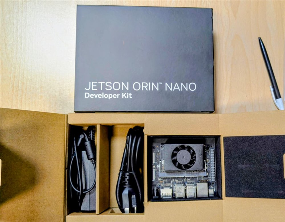 NVIDIA Jetson Orin Nano developer kit in its box, with the board and power supply